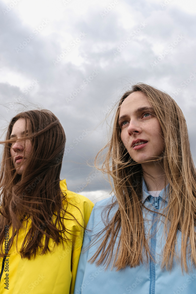 Two girls in support of peace. Dedicated to events in Ukraine