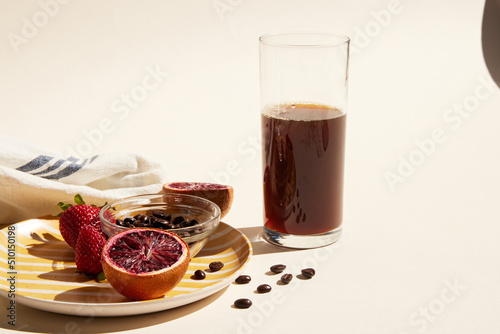 Tall glass of coffee and breakfast