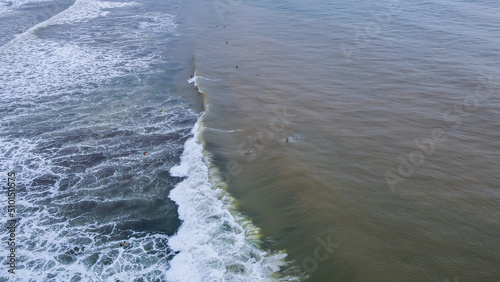 Beautiful aerial view of Surfers in Hermosa Beach - Jaco in Costa Rica