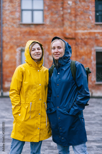 Portrait of female migrants in foreign town  photo