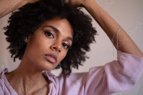 Cape Verdean classy woman portrait with shirt photo