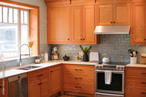 Kitchen with wood cabinets.