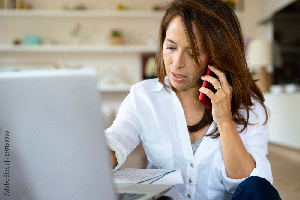 Businesswoman discussing project on smartphone Businesswoman discussing project on smartphone