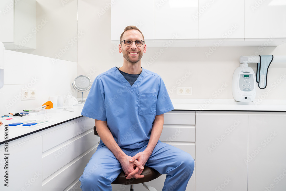Smiling Dentist In Dental Clinic Smiling Dentist In Dental Clinic