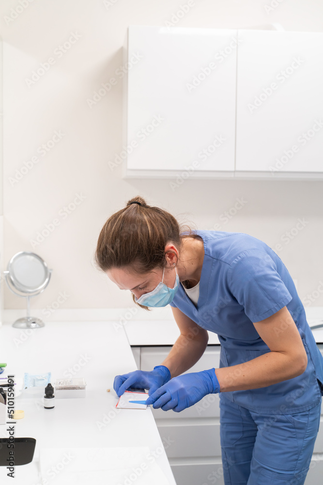 Dentist Working in Dental Clinic Dentist Working in Dental Clinic