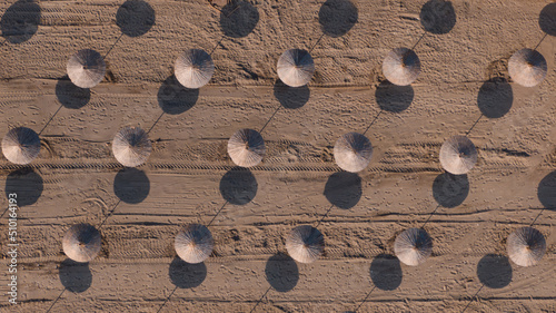 drone aerial photo of umbrellas on the beach