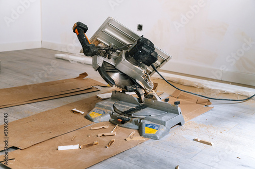 Miter saw on floor during renovation