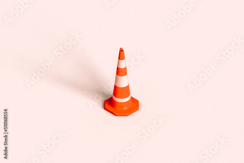 a traffic cone on a pink background. 3d render