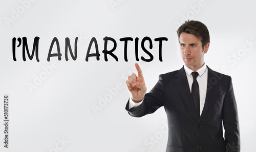 Man touching on a touchscreen with “I'm an artist” text