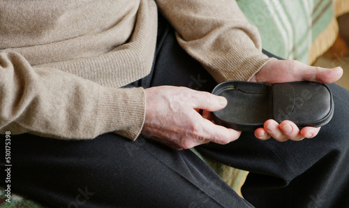 Senior man looking his empty wallet