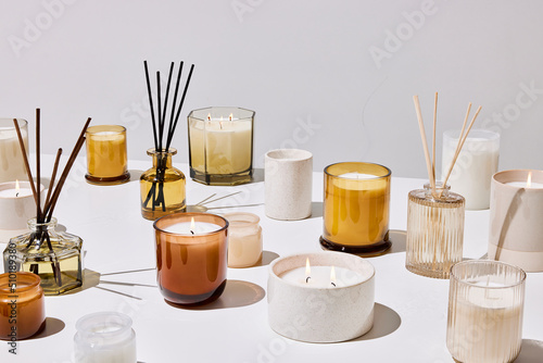 Candles and reed diffusers for aromatherapy session photo