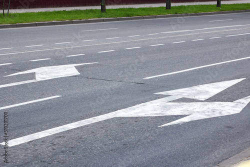 Marking of the arrow pointer on the asphalt road
