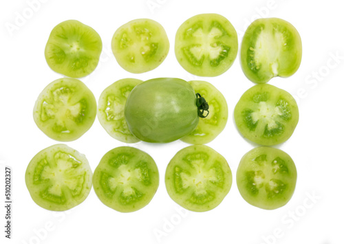 Green tomatoes slice isolated on white background.