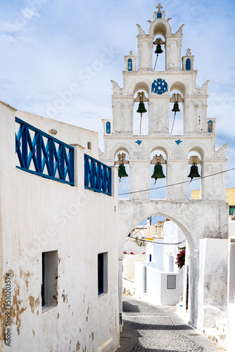 Santorini: The bell tower with three levels of Agii Anargiri church in Megalochori photo