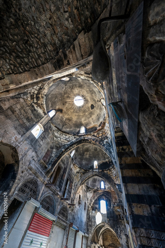 Al-Madina Souq, the Aleppo Souq, largest covered historic market in the world, part of the Aleppo World Heritage site. The Souq was badly damaged during Syrian civil war and is currently mostly empty. photo