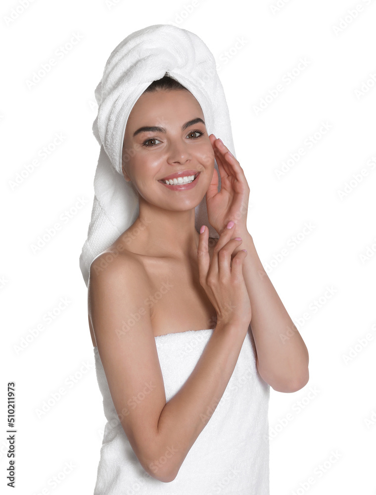 Beautiful young woman with towels on white background Beautiful young woman with towels on white background