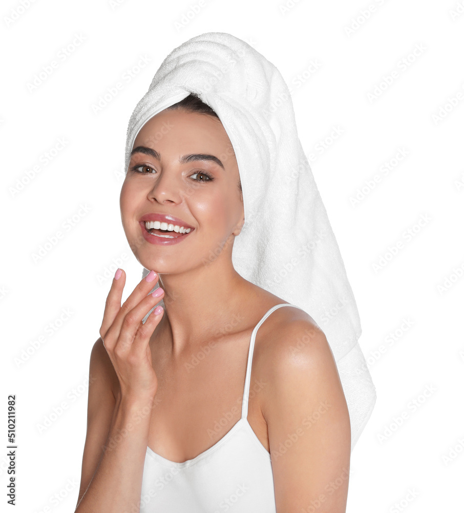 Beautiful young woman with towel on head against white background Beautiful young woman with towel on head against white background