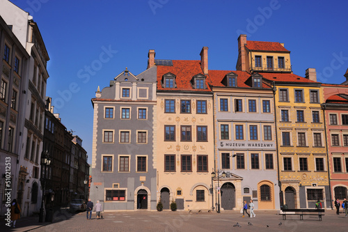 WARSAW, POLAND - MARCH 22, 2022: Beautiful view of Old Town city street on sunny day