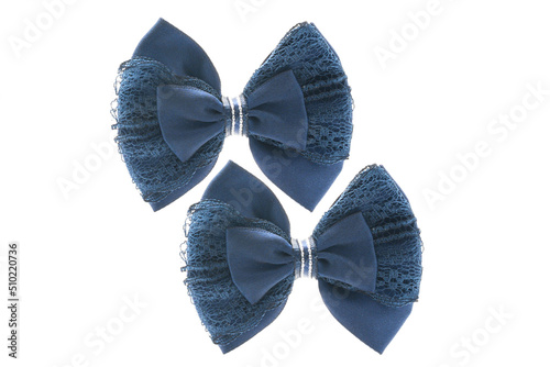 Slika na platnu Blue satin bow for hair for girl, woman isolated on white background