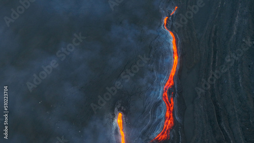 Colata di lava sul vulcano Etna in eruzione -Sicilia dall'alto photo