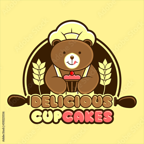 cute bear who acts like a chef making cupcakes