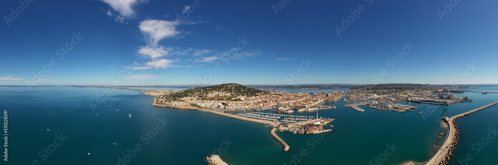 Panorama of the marina and commercial port of Sète on a summer day, in Hérault in Occitanie, France