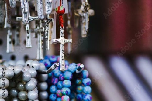 A close up photograph of the crucifix on the souvenir rosary in Medjugorje, Bosnia and Herzegovina.