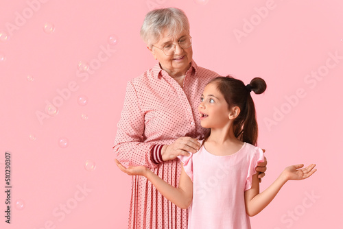 Senior woman with her littl...