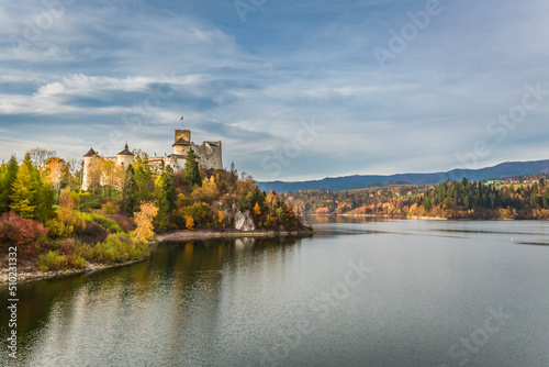 Niedzica castle by the lake in autumn, Poland