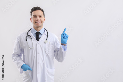 Male doctor in rubber glove...