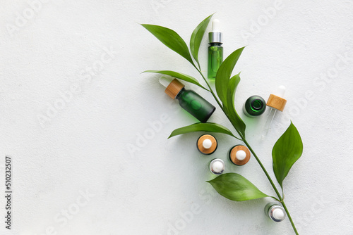 Bottles of natural serum an...