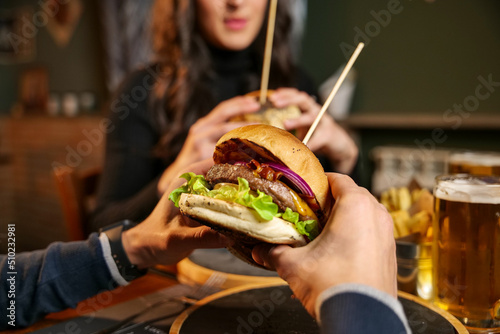tasty beef sandwich in black background