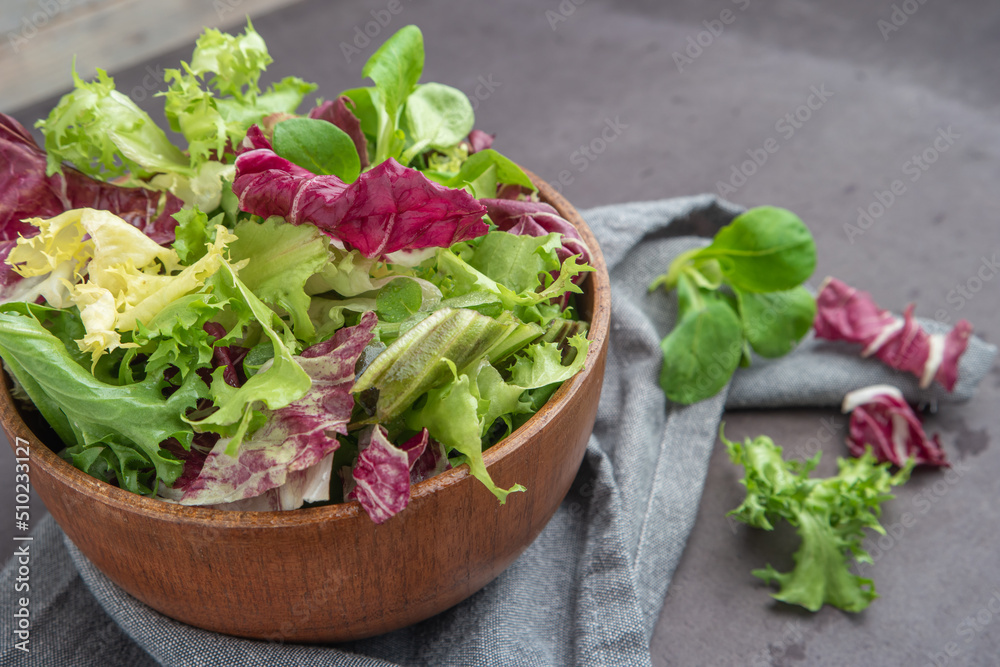 Fresh green salad with spinach,arugula,romaine and lettuce Fresh green salad with spinach,arugula,romaine and lettuce