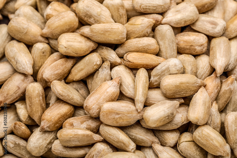 Closeup view of peeled sunflower seeds as background Closeup view of peeled sunflower seeds as background