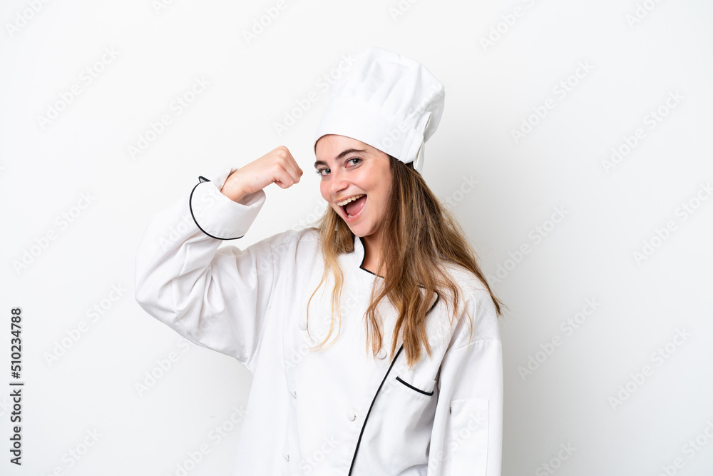Young caucasian chef woman isolated on white background doing strong gesture