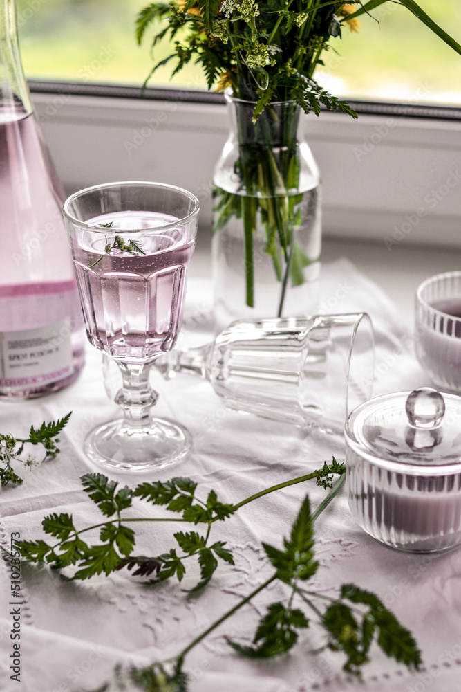 Breakfast of the rich: rosé sparkling wine and flowers. Breakfast of the rich: rosé sparkling wine and flowers.