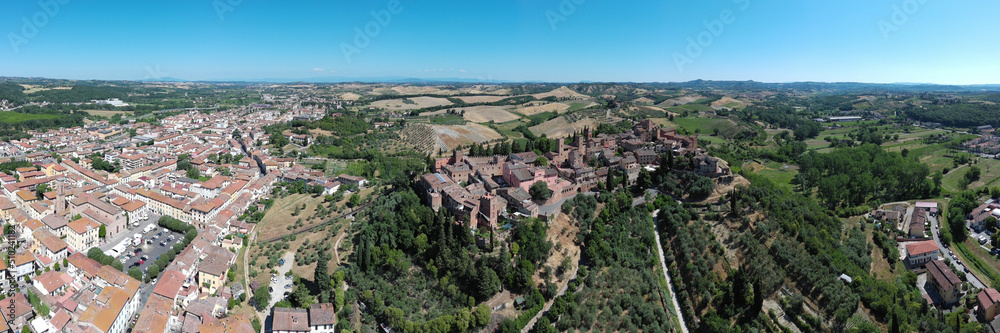 extended panoramic aerial view of the medieval town of certaldo in tuscany