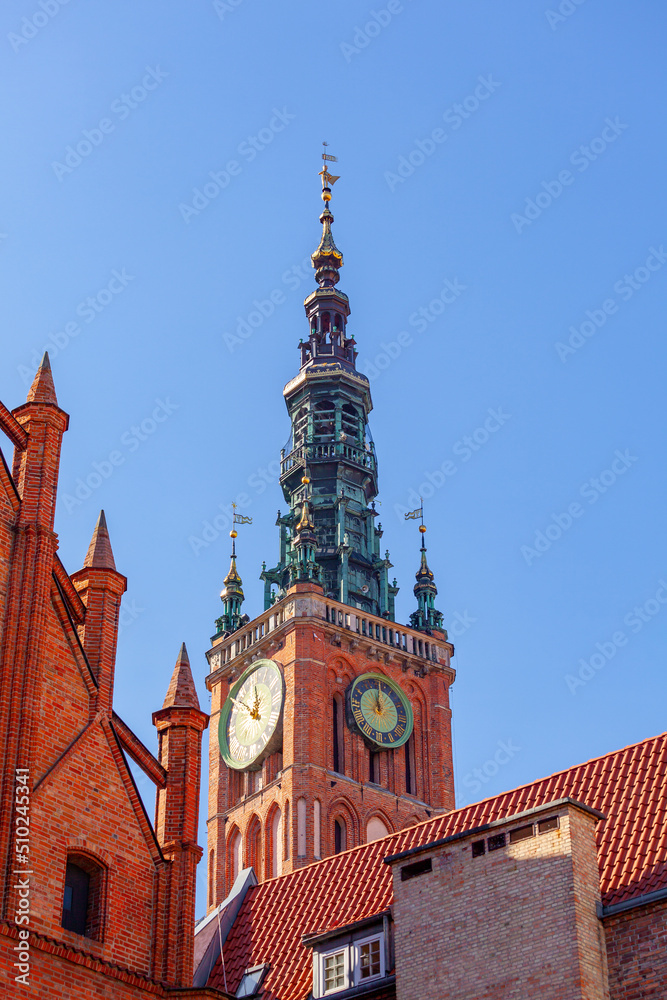 Red brick church tower in the center of the city of Gdansk