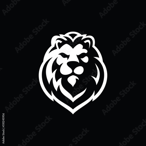 Lion head silhouette logo design. Lion head vector illustration on dark background