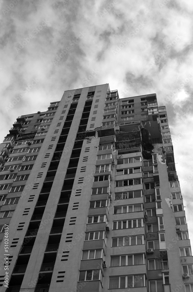 Fototapeta premium The air conditioner pulled an Ukrainian anti-aircraft missile in Kiev at February 25, 2022. The consequences of the explosion are visible in residential building. Ukraine
