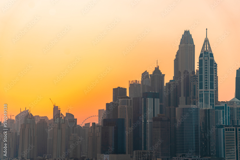 Obraz premium View of the skyline by Dubai Marina, Jumeira lajke towers and the Media City