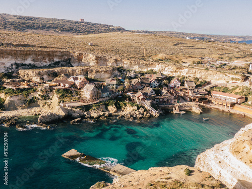 Aerial view of Popeye Village. Sunny day, blue sea, blue sky. Mellieha city. Malta