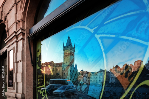 Photography Reflection of Church of Our Lady before Tyn in a shop window on Old Town Square