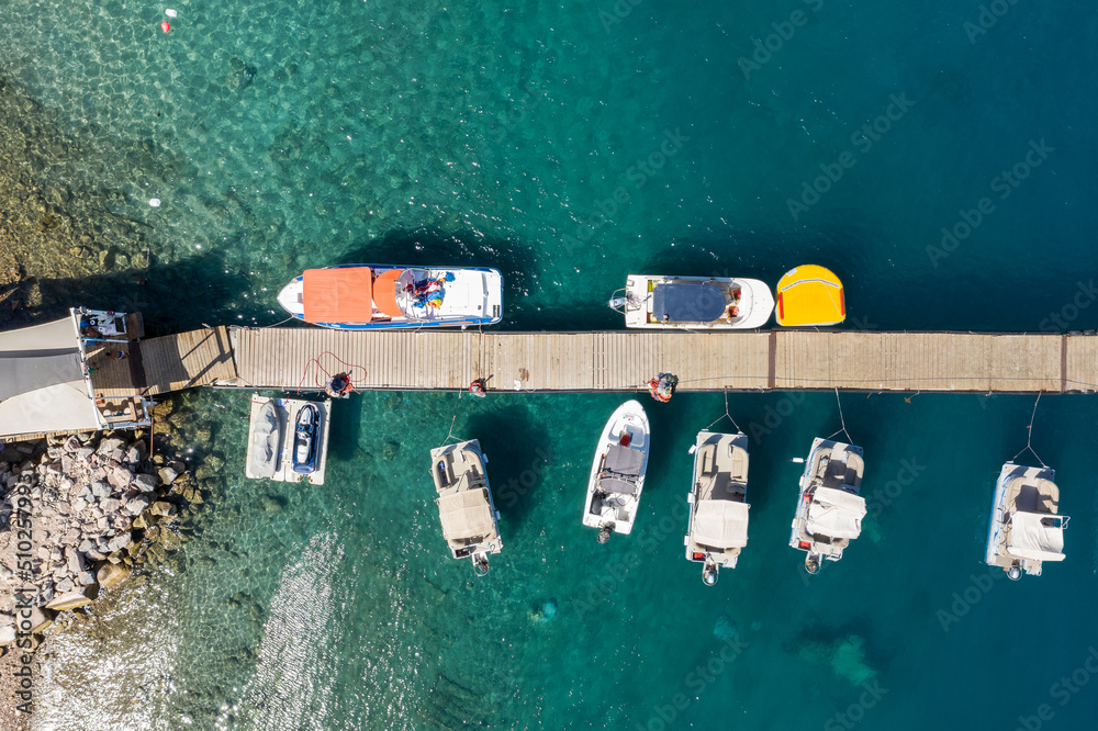 Eilat \ israel Aug 20 2020 : Top view of a floating pier and colorful boats next to it