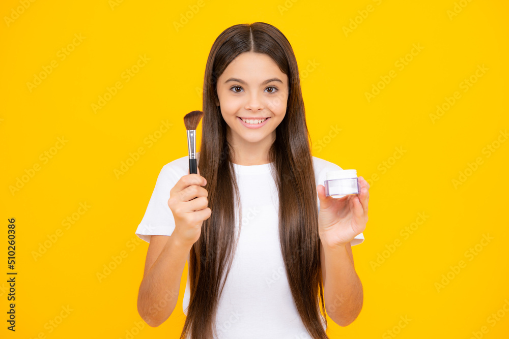 Child girl 12, 13, 14 years old making beauty make up with powder and brush. Beautiful teenager applying makeup. Happy teenager portrait. Smiling girl. Child girl 12, 13, 14 years old making beauty make up with powder and brush. Beautiful teenager applying makeup. Happy teenager portrait. Smiling girl.