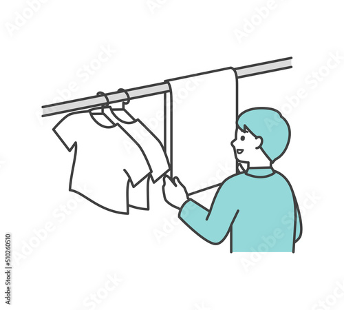 洗濯物を干す男性のイラスト素材