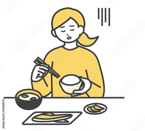 食事をする女性のイラスト素材