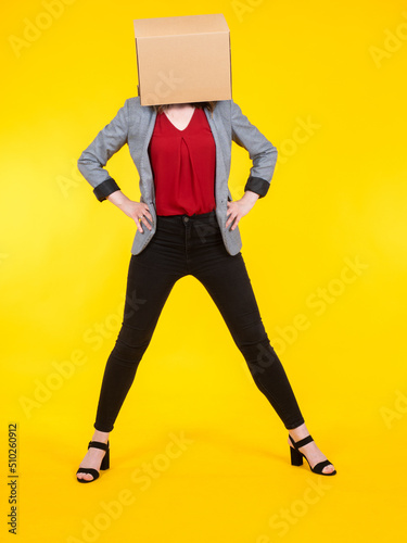Woman with carboard box. Gi...