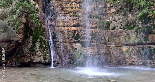Waterfall and pool in the desert. Waterfall, Ein Gedi, Israel photo