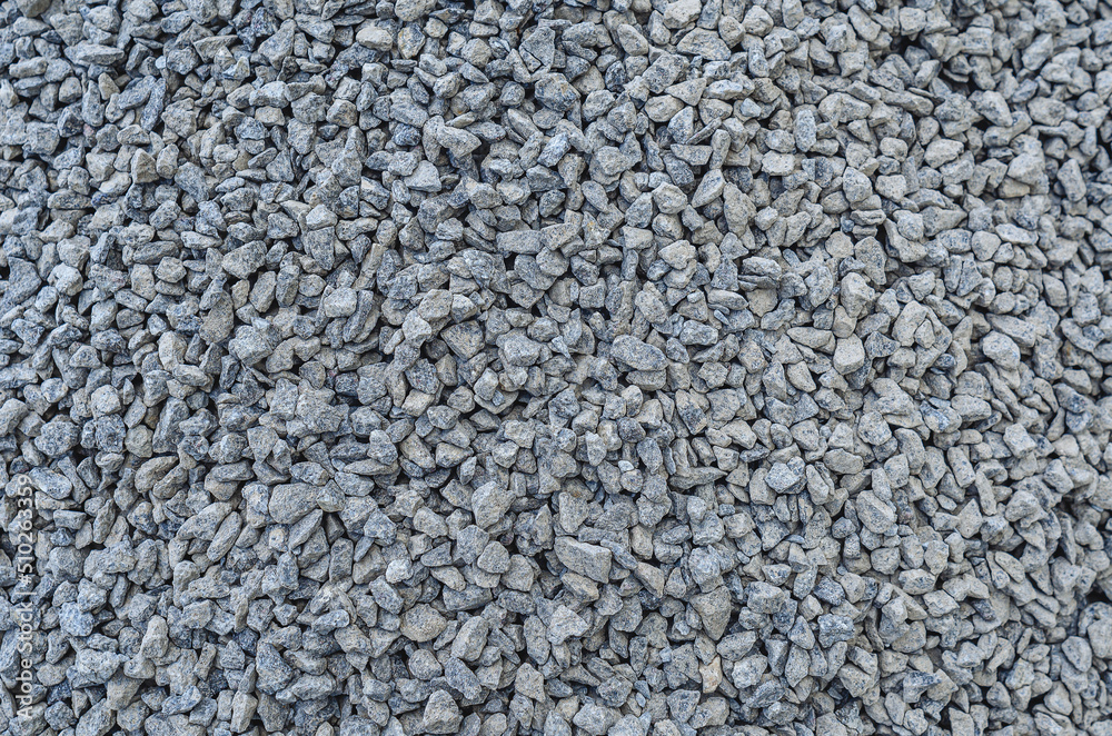 Abstract stone texture. Fine gray gravel. Small gray stones. Building material. Abstract stone texture. Fine gray gravel. Small gray stones. Building material.